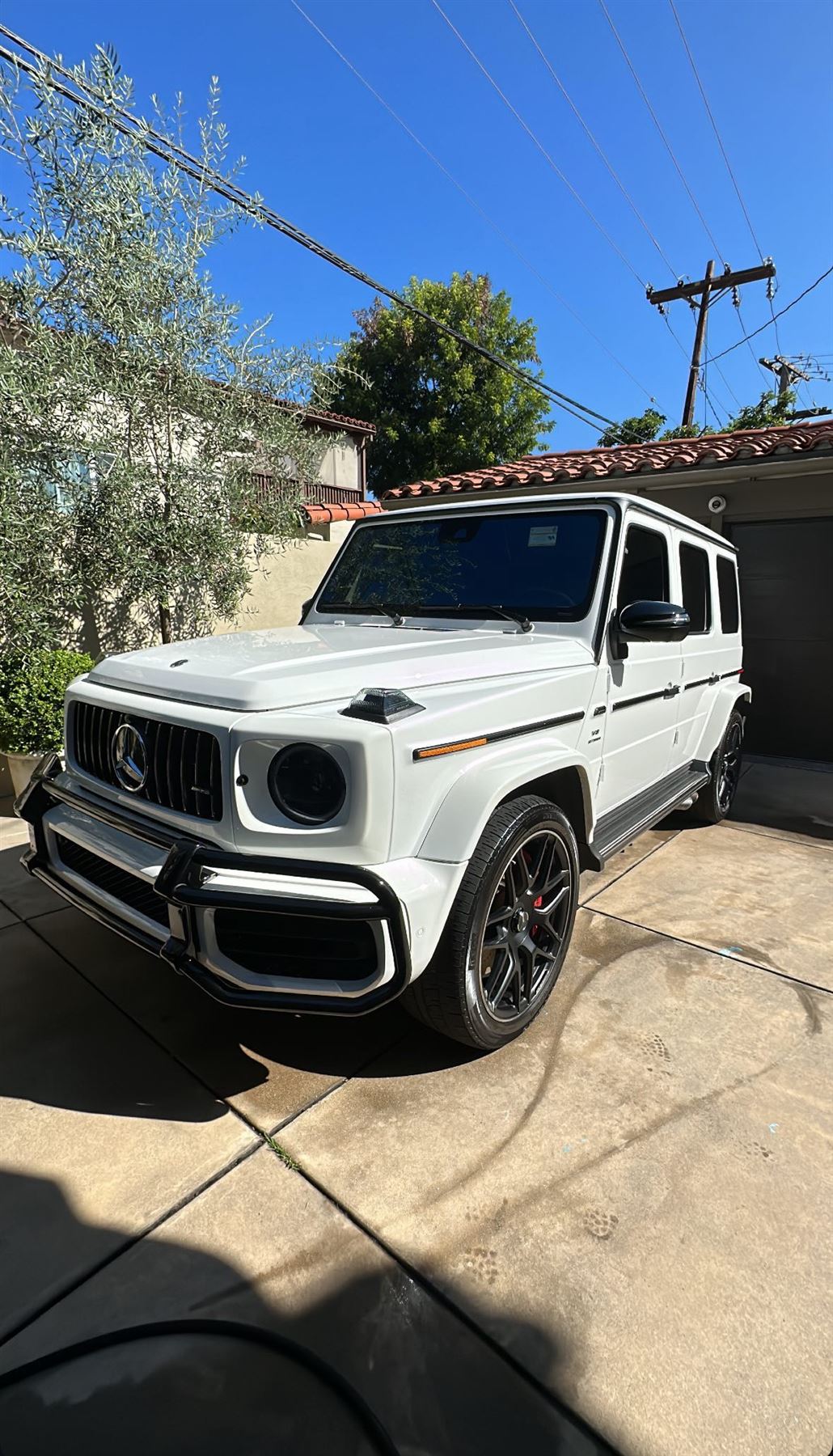 Freshly detailed white Mercedes-AMG G63